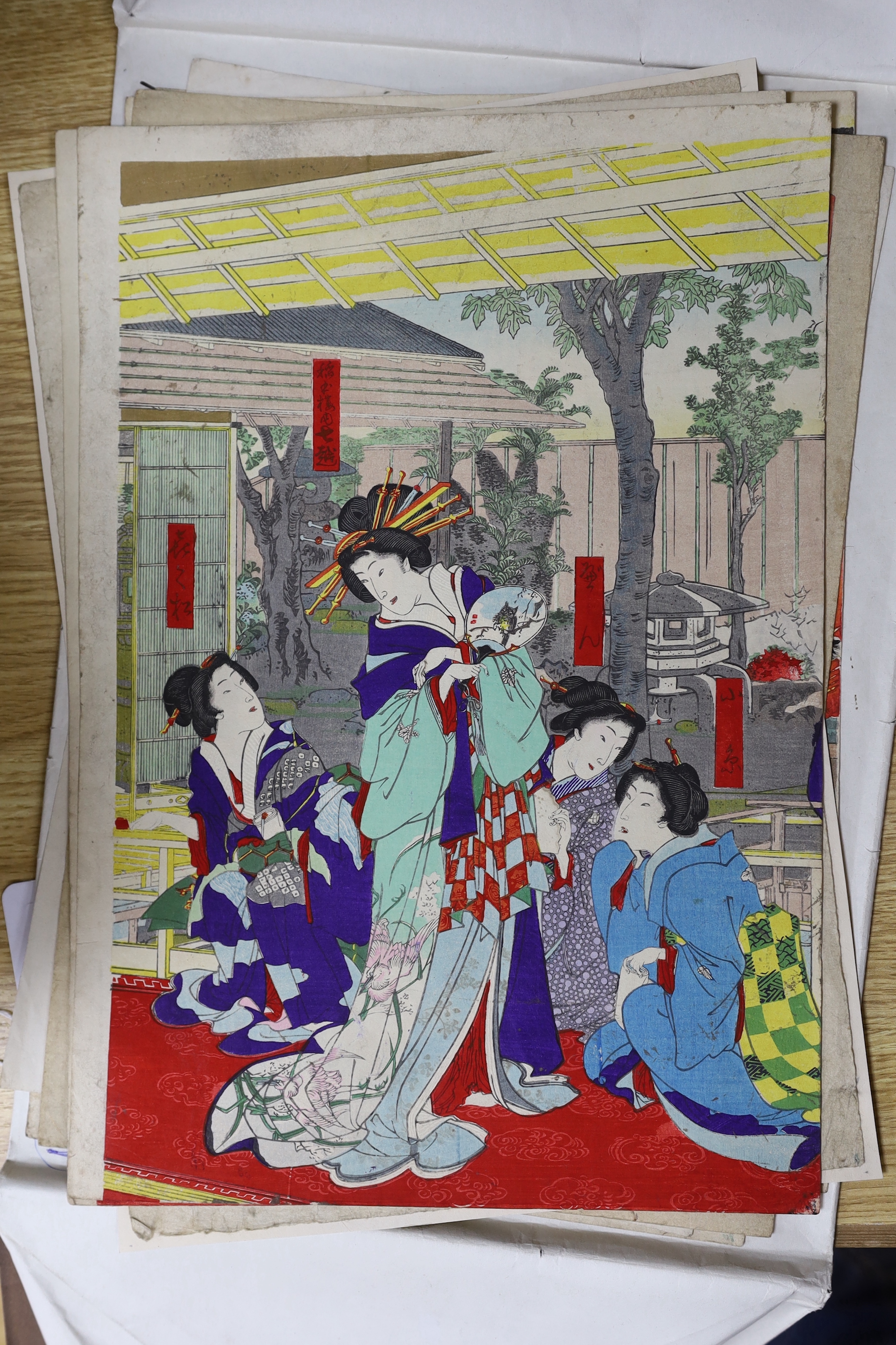 Eleven Japanese woodblock prints including one after Utagawa Kuniyoshi and one after Yanagawa Shigenobu, unframed, 37 x 25cm